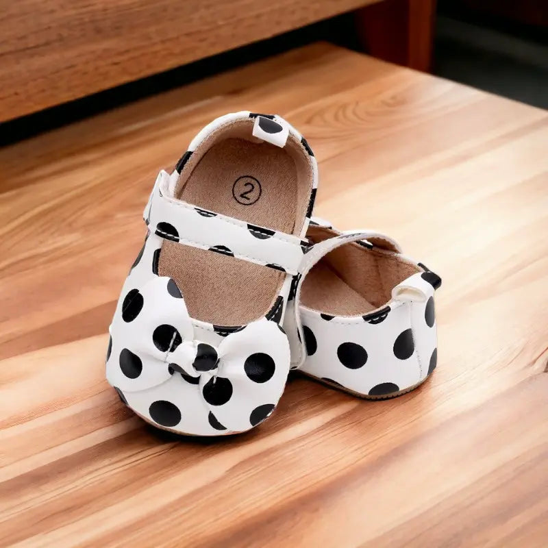 Ballerines en cuir avec un nœud papillon pour bébé