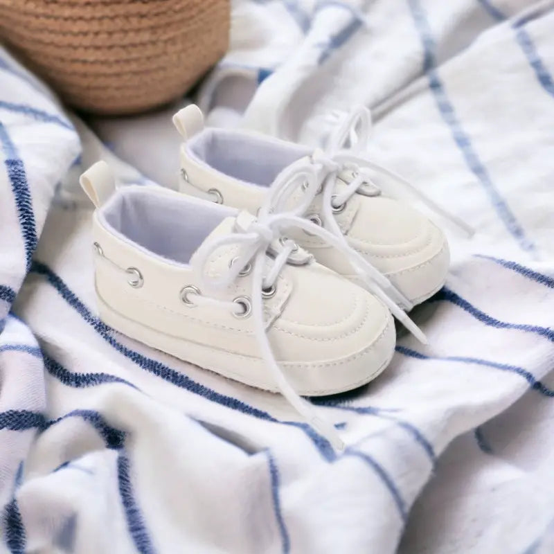 Chaussures bateau en cuir pour bébé