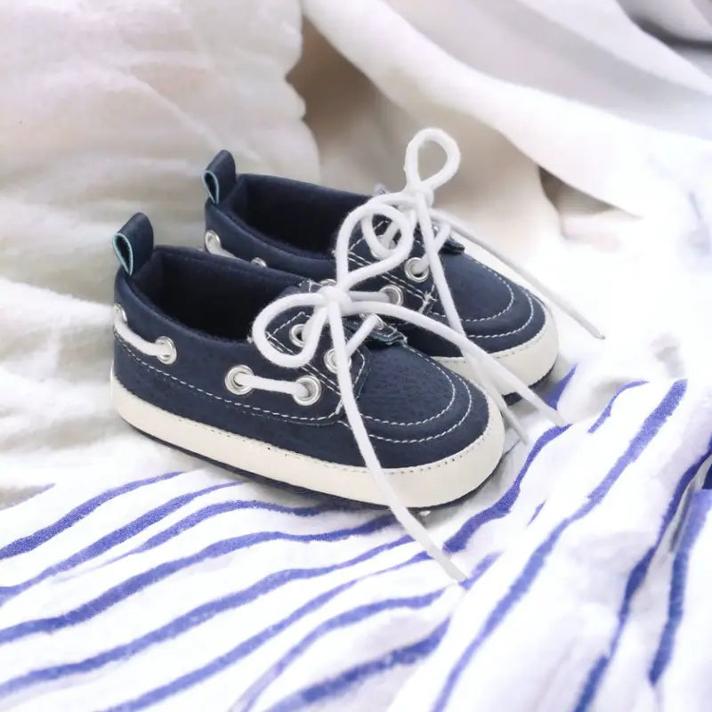 Chaussures bateau en cuir pour bébé